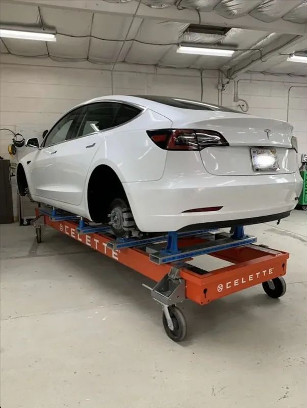 Tesla on the rack at Torrey Pines Collision Center